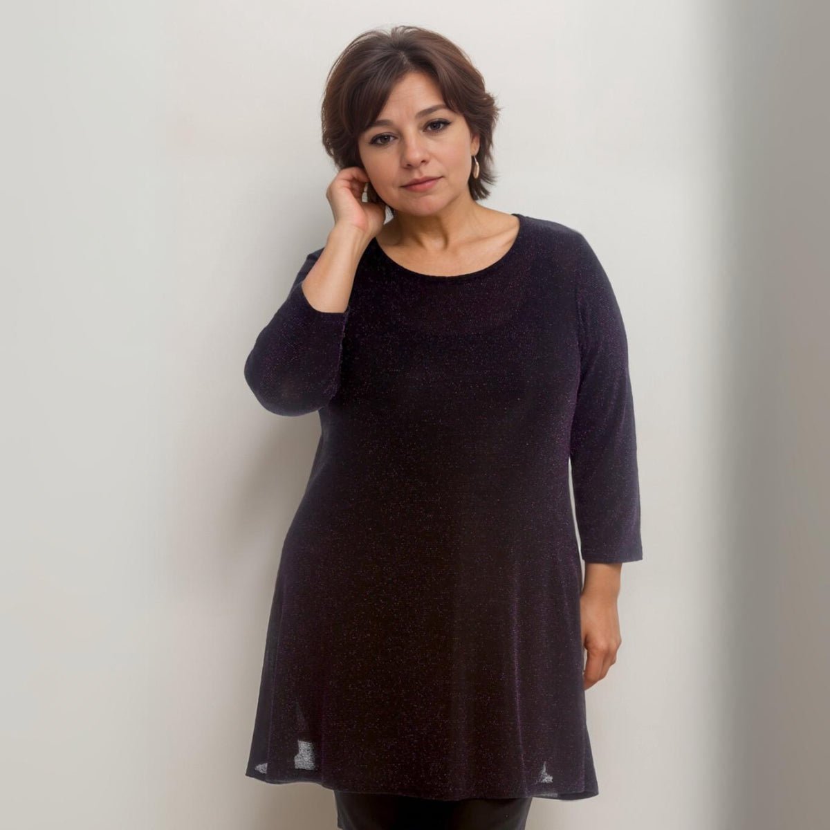 Black Tunic Top featuring a relaxed fit and three-quarter sleeves.