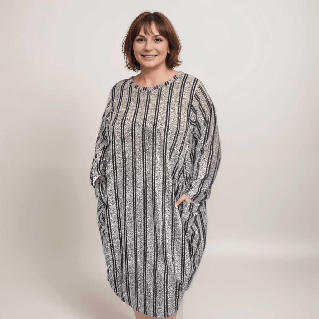 Striped oversized dress featuring pockets and a relaxed fit.