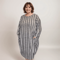 Striped oversized dress featuring pockets and a relaxed fit.