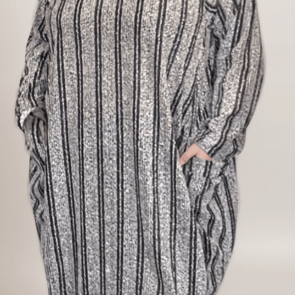 Striped oversized dress featuring pockets and a cozy design.