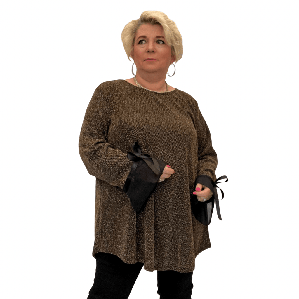 Shimmering brown oversized top with black ribbon sleeves.