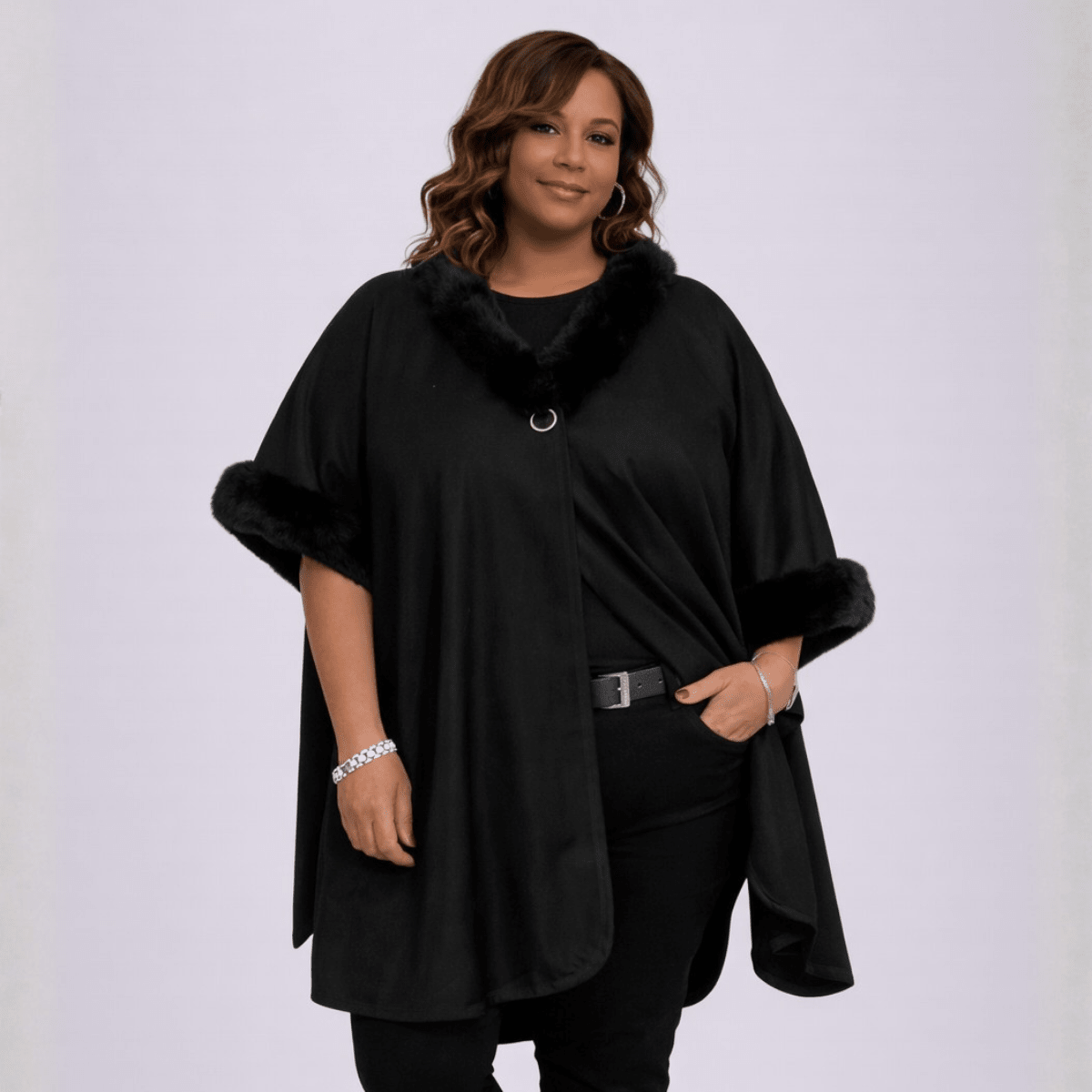 Black Faux Fur Cape featuring a stylish collar and elegant design.