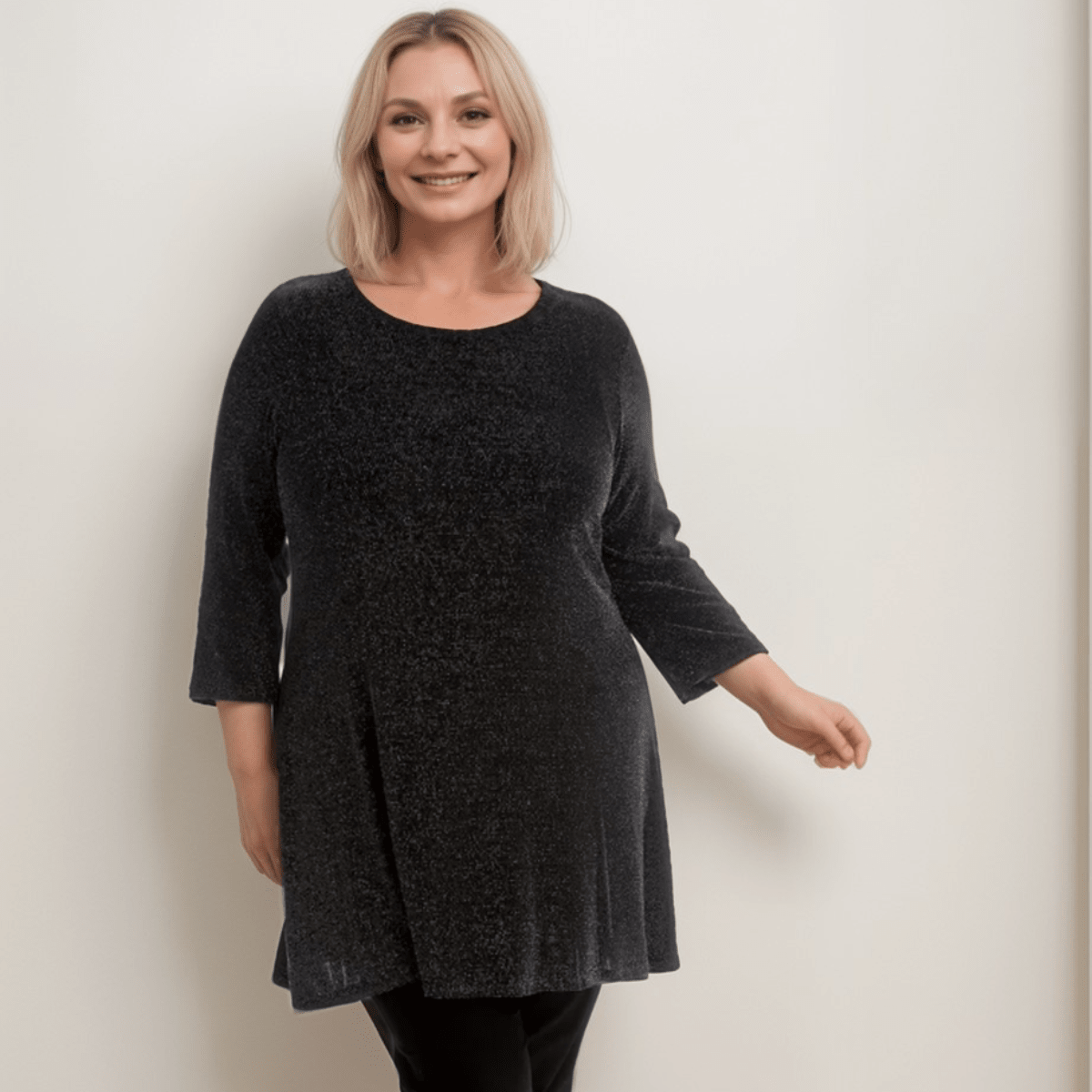 Black Sparkle Tunic featuring a relaxed fit and three-quarter sleeves.