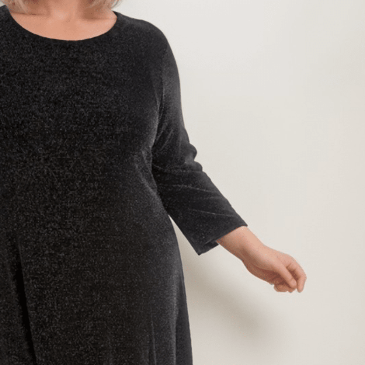 Black Velvet Dress featuring three-quarter sleeves and a relaxed fit.