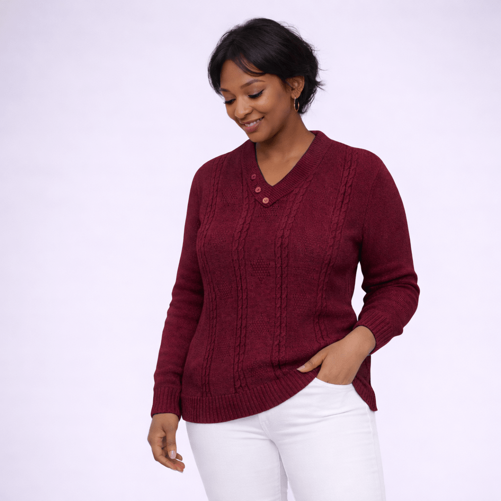 Burgundy cable knit sweater with a v-neck and button detail, perfect for cozy outfits.