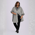 Gray cape with faux fur collar, featuring a button closure and stylish design.