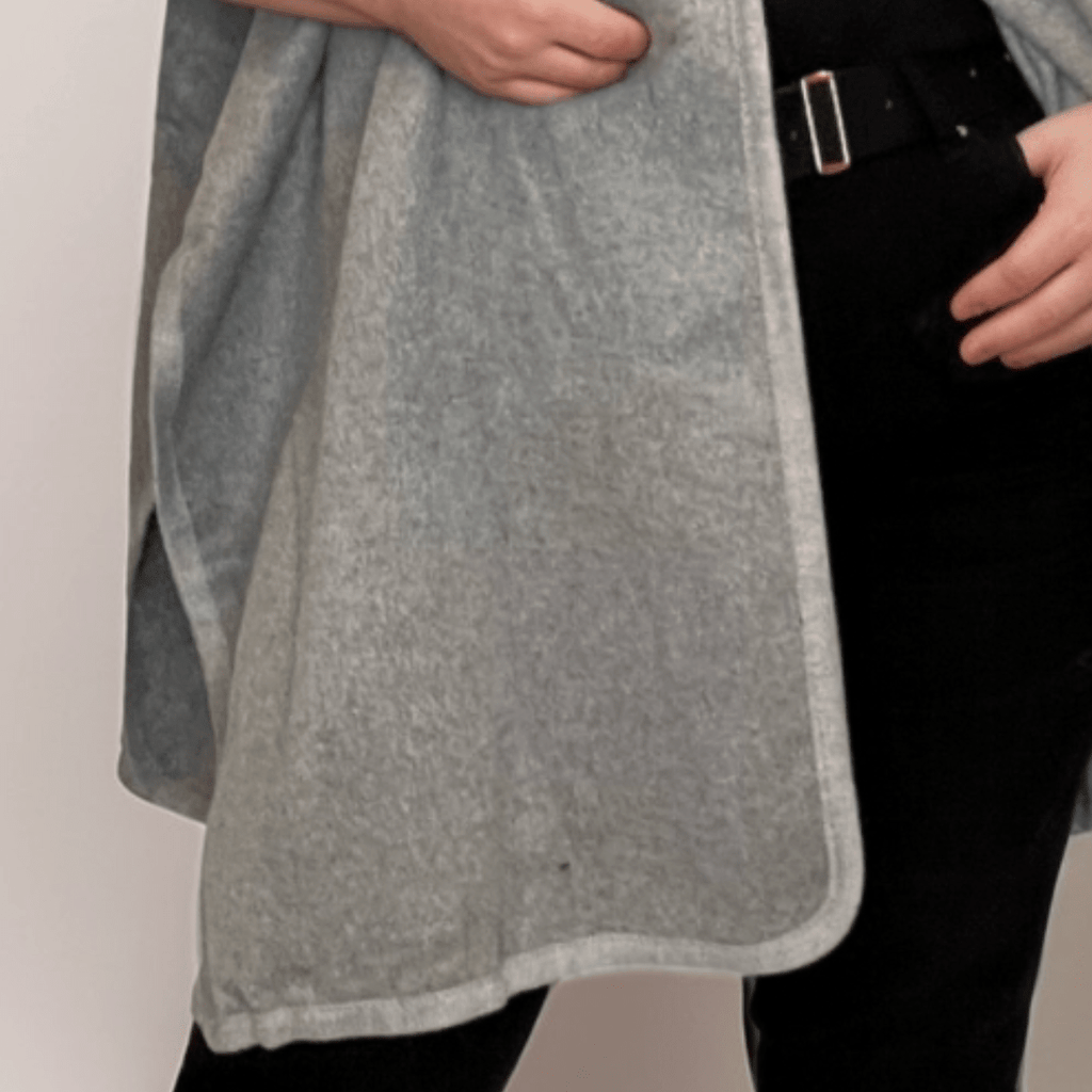 Cozy gray shawl wrap featuring a soft texture and stylish design.