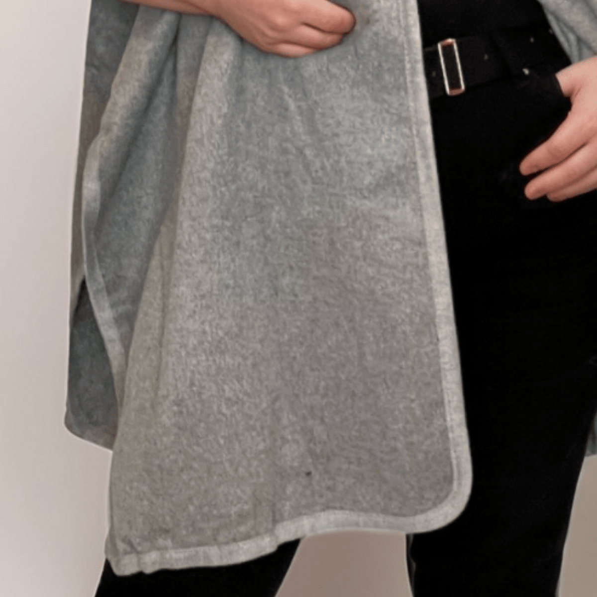 Cozy gray shawl wrap featuring a soft texture and stylish design.