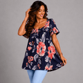 Floral Navy Tunic Top featuring vibrant pink flowers and a relaxed fit.