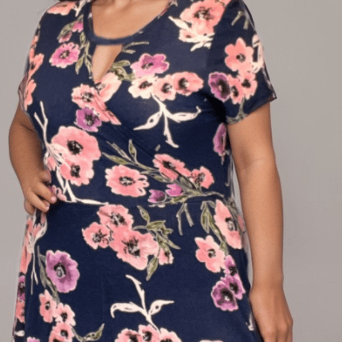 Floral Wrap Dress featuring pink and purple flowers on a navy background.