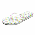 Colorful Polka Dot Flip Flop featuring a white base with vibrant dots in pink, green, and blue.