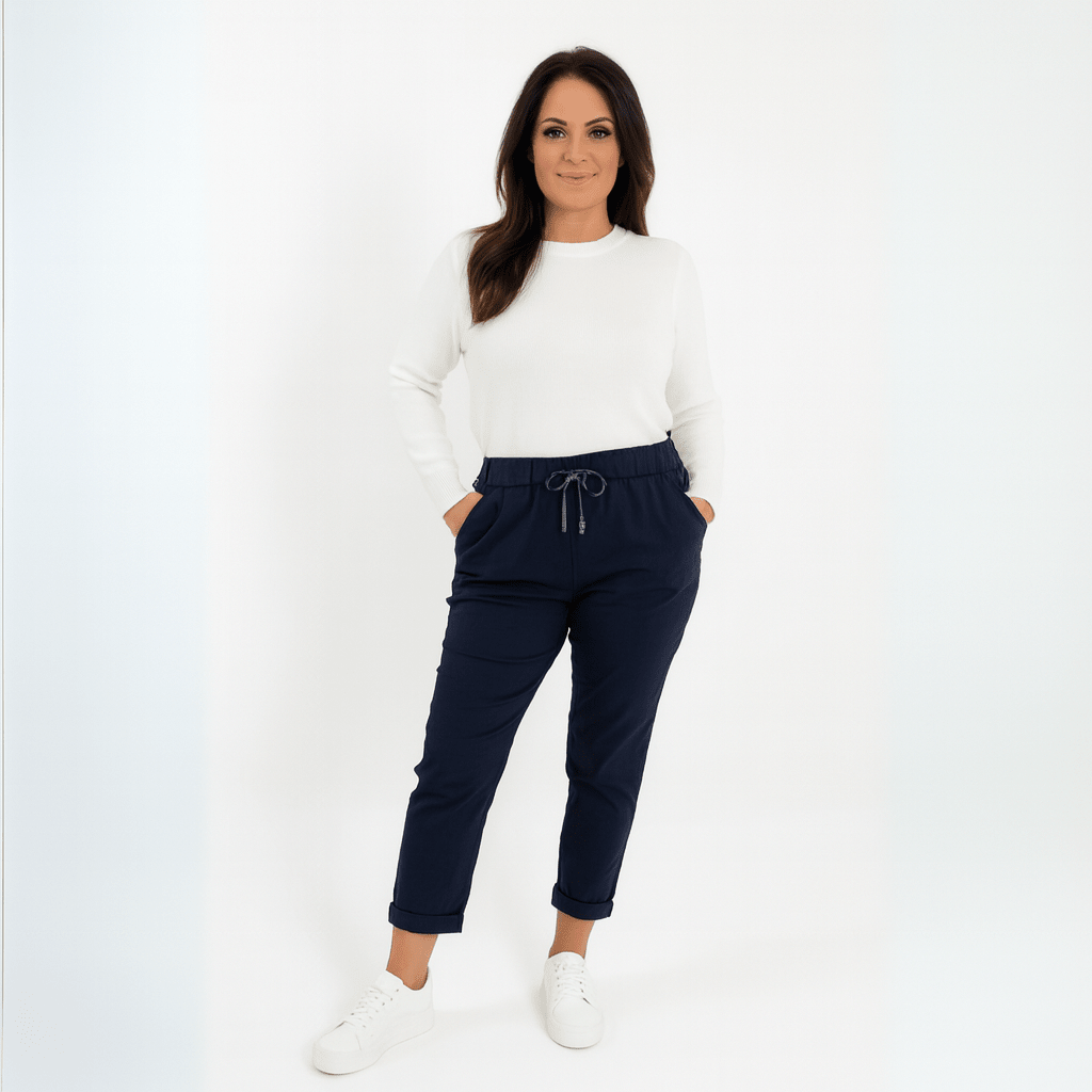Comfortable navy joggers featuring an elastic waistband and side pockets.