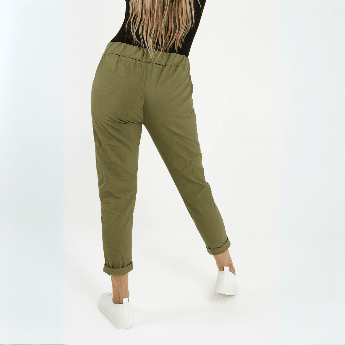 Olive Green Casual Pants featuring a relaxed fit and rolled cuffs.