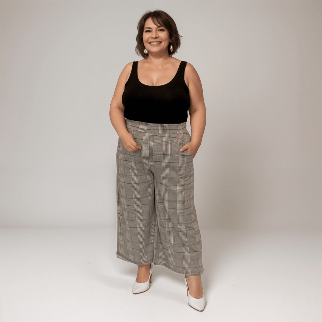 Plaid Wide-Leg Trousers featuring a relaxed fit and side pockets.