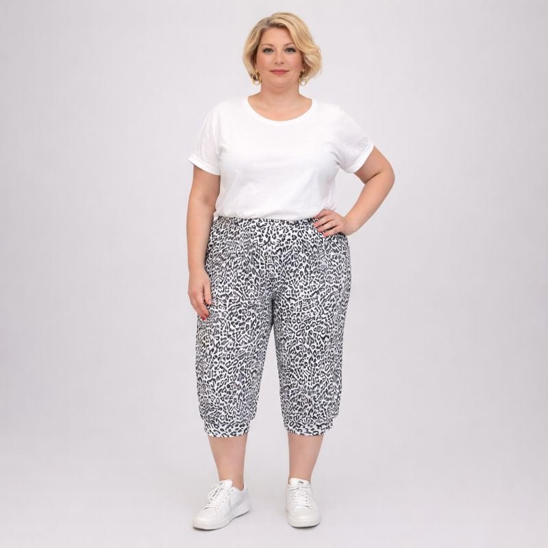 Comfortable Plus Size Printed Capris featuring a stylish black and white pattern.