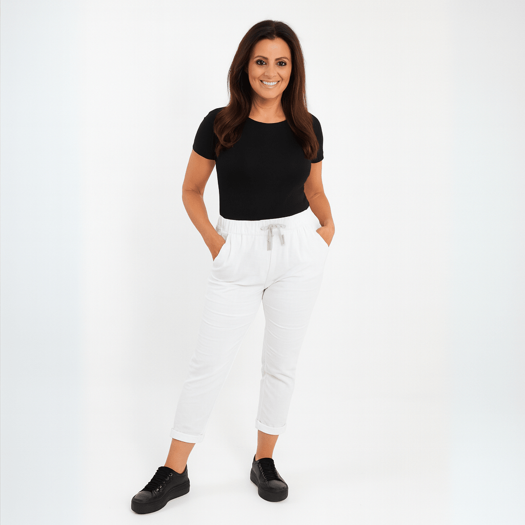 Comfortable White Jogger Pants featuring an elastic waistband and side pockets.