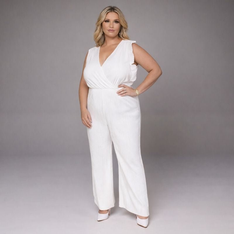 White jumpsuit featuring a flattering V-neckline and wide-leg design.